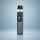 Vaporesso XROS 6 Pod-Kit Racing Navy – Petrol mit Carbonmuster mit Display vor dezentem Hintergrund